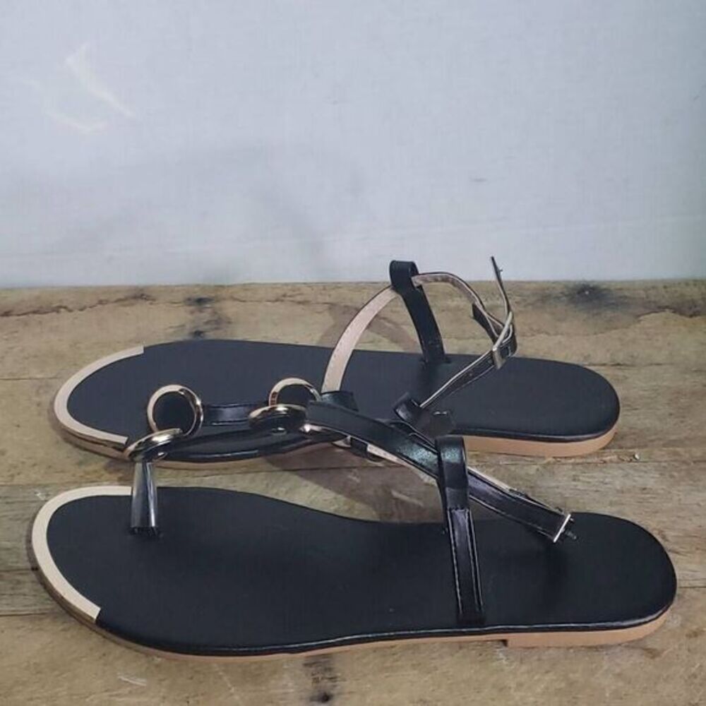 Woman's black studded flat Roman sandals rose gold strappy summer